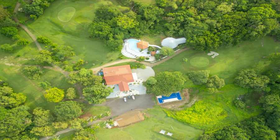 clubhouse, trees,  pool, golf course