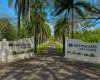 front entrance, palm trees