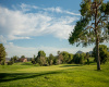 golf course, clubhouse, mountains