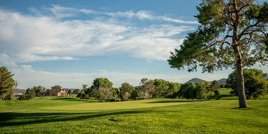golf course, clubhouse, mountains