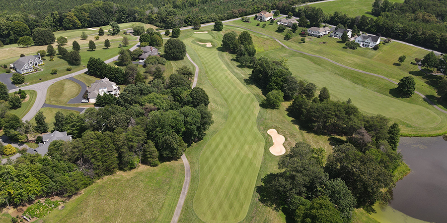 houses, trees, golf course